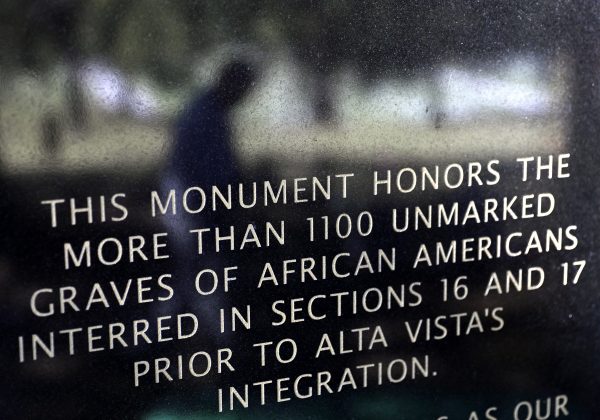 In this Friday, Oct. 20, 2017 photo, an inscription decorates a monument to honor African-Americans who were buried in unmarked graves in the previously segregated Alta Vista Cemetery in Gainesville, Ga. The previously unmarked graves of more than 1,100 black souls buried in the cemetery will be honored with a memorial to be dedicated Sunday. Recently, the city discovered the extent of the unmarked graves using ground-penetrating radar. (AP Photo/David Goldman)