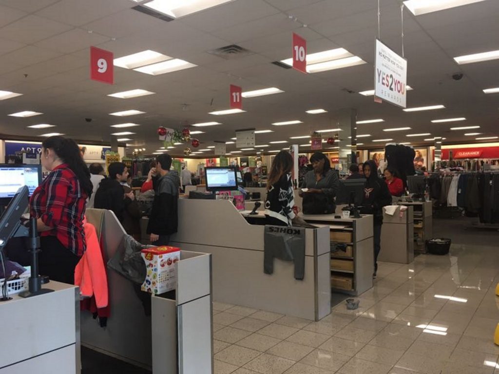 Sales associates at the Kohl's in Duluth were busy with customers on Black Friday. (Tasnim Shamma/WABE)