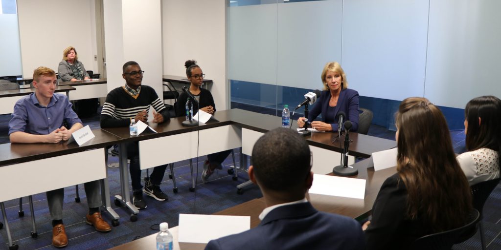 U.S. Education Secretary Betsy DeVos visited Georgia State University on Tuesday to see the school’s student advisement center and to talk to students about their experiences applying for federal financial aid.
