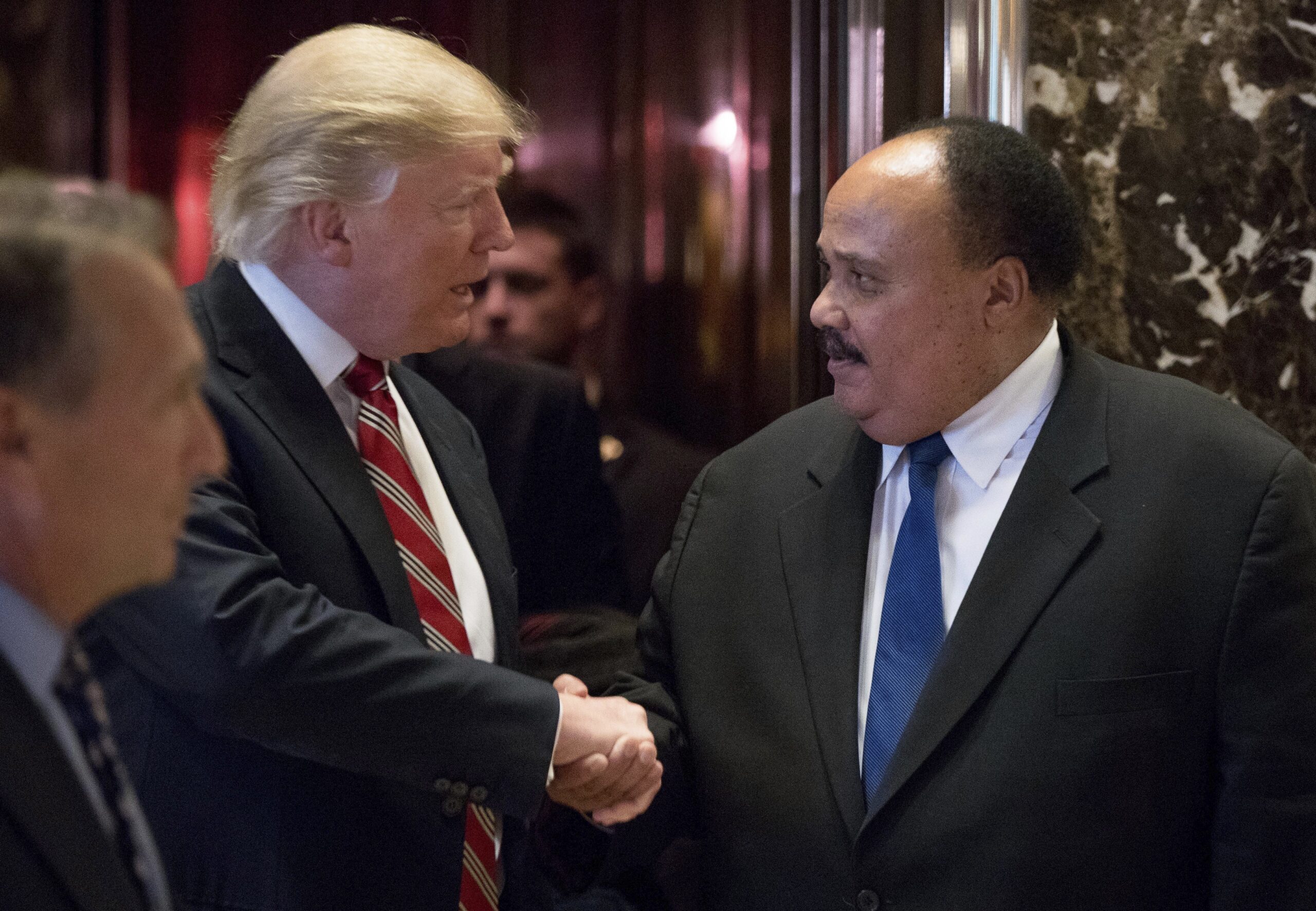 Racial Firestorm Surrounds Trump At MLK Holiday