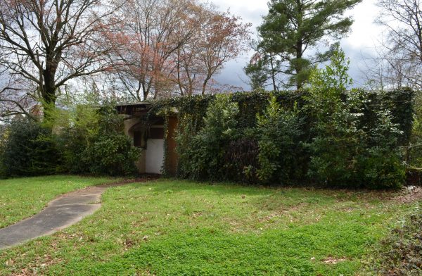 The home of Georgia's first black female legislator, Grace Towns Hamilton, is boarded up and overgrown.