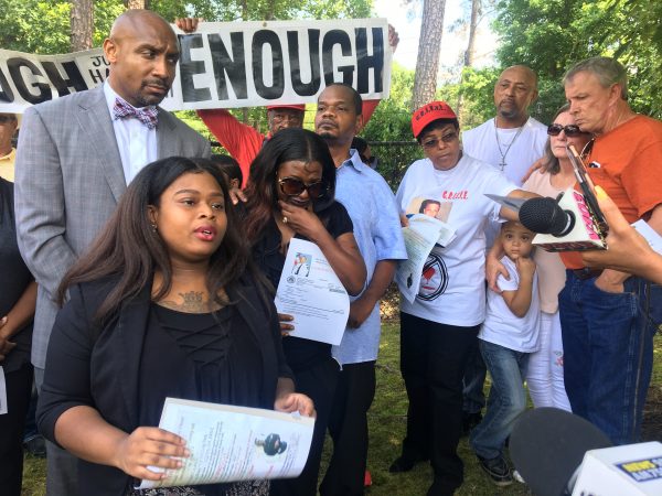 Shali Tilson's sister, Diamond Tilson, front left, said she assumed her brother would be safe at the Rockland County jail. Tilson's mother, in sunglasses, and Jamie Henry's family are also pictured. The families are planning a June 9 march to demand an external investigation of the jail. (Lisa Hagen/WABE)