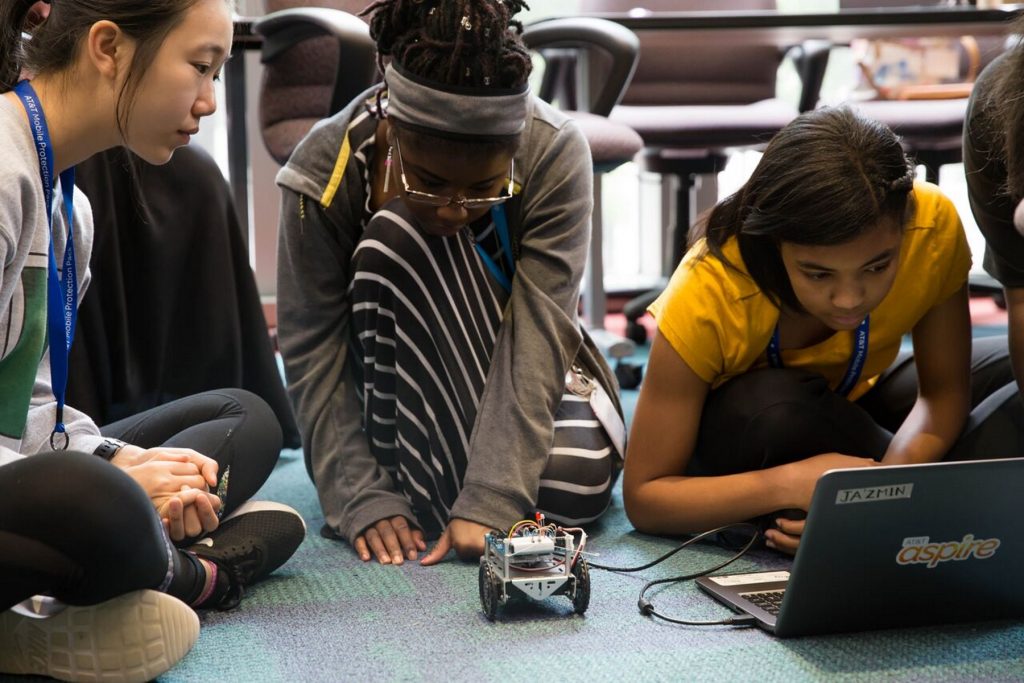 Girls Who Code aims to close the gender gap in the tech sector, but proponents say the bigger idea is to get students comfortable using technology, regardless of the careers they choose. (Ian Palmer/WABE)