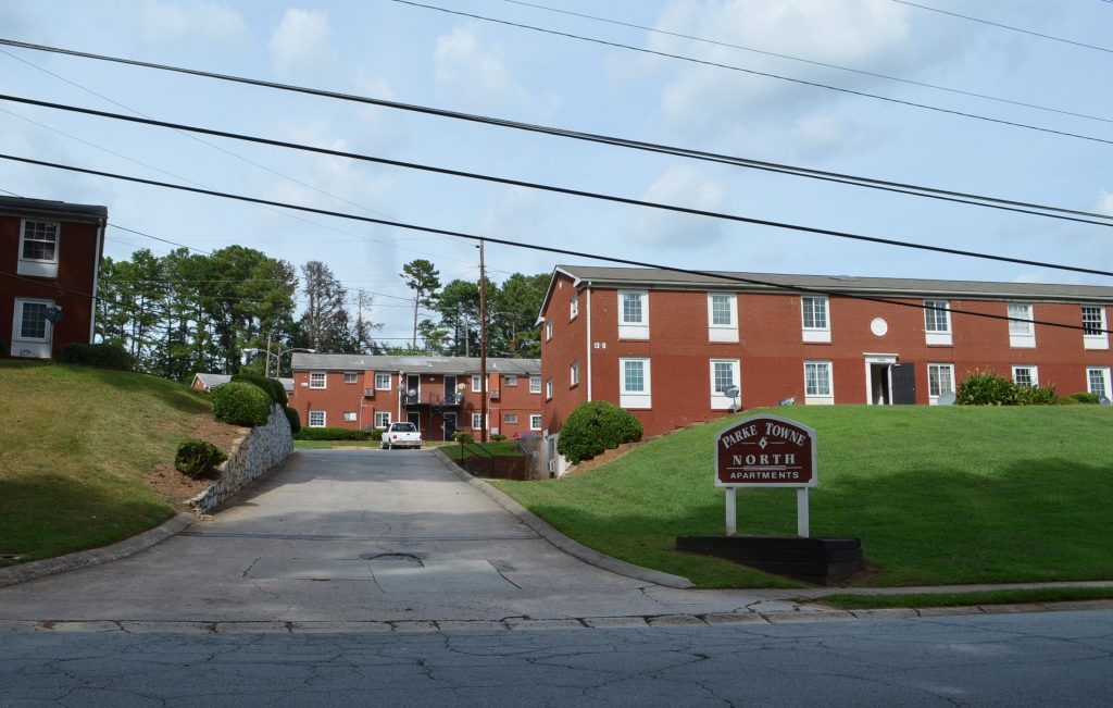 Buford Highway's older apartment complexes are substandard, according to Brookhaven city manager Christian Sigman. (Stephannie Stokes/WABE)