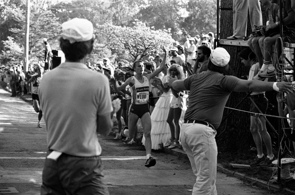 Grete Waitz of Norway crosses the finish line on Monday, July 4, 1983, in Atlanta to win the women's division of the annual Peachtree Road Race. Her time for the 6.2-mile race was 32 minutes. (AP Photo)
