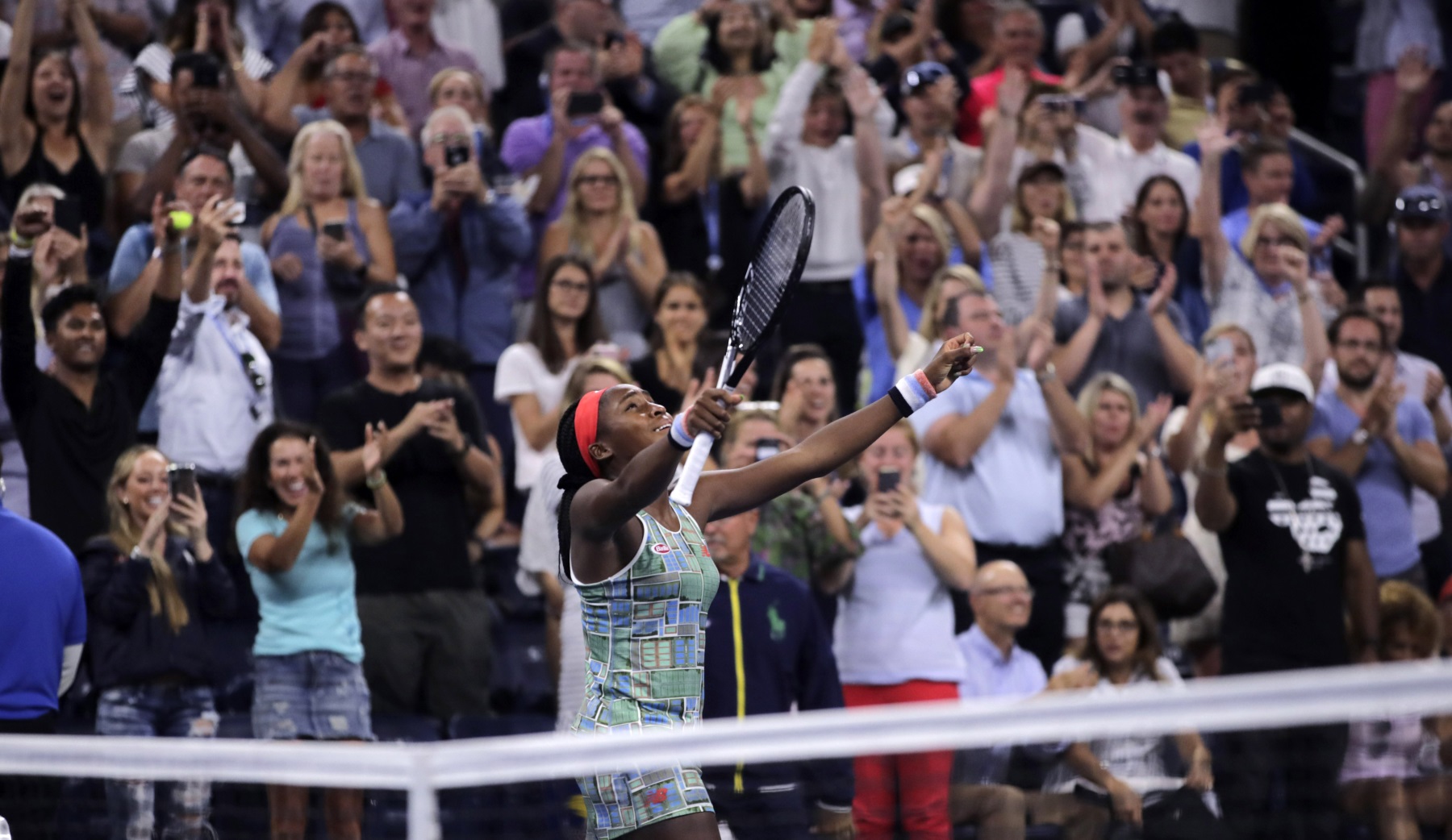 Coco Gauff celebrating with US Open crowd