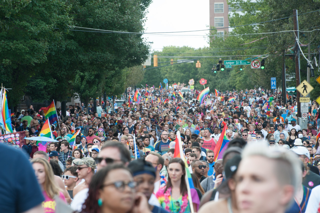 Crowds walk down streets of Atlanta during a previous Atlanta Pride. 
