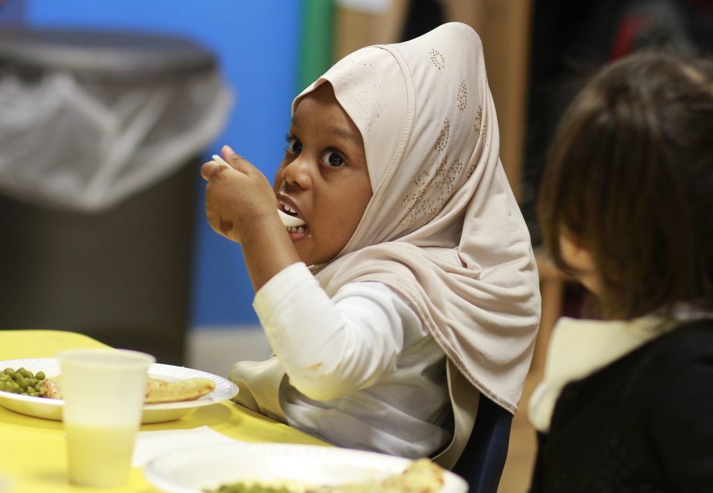 Student eats lunch at Scottdale Early Learning, Inc.
