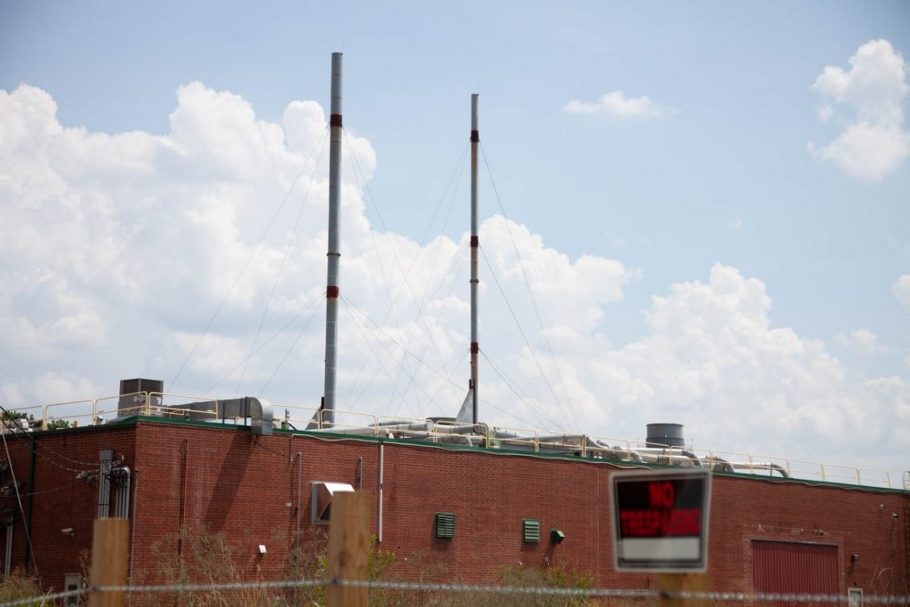 Sterilizing Firm Sues After Cut In Tax Value Of Nearby Homes
