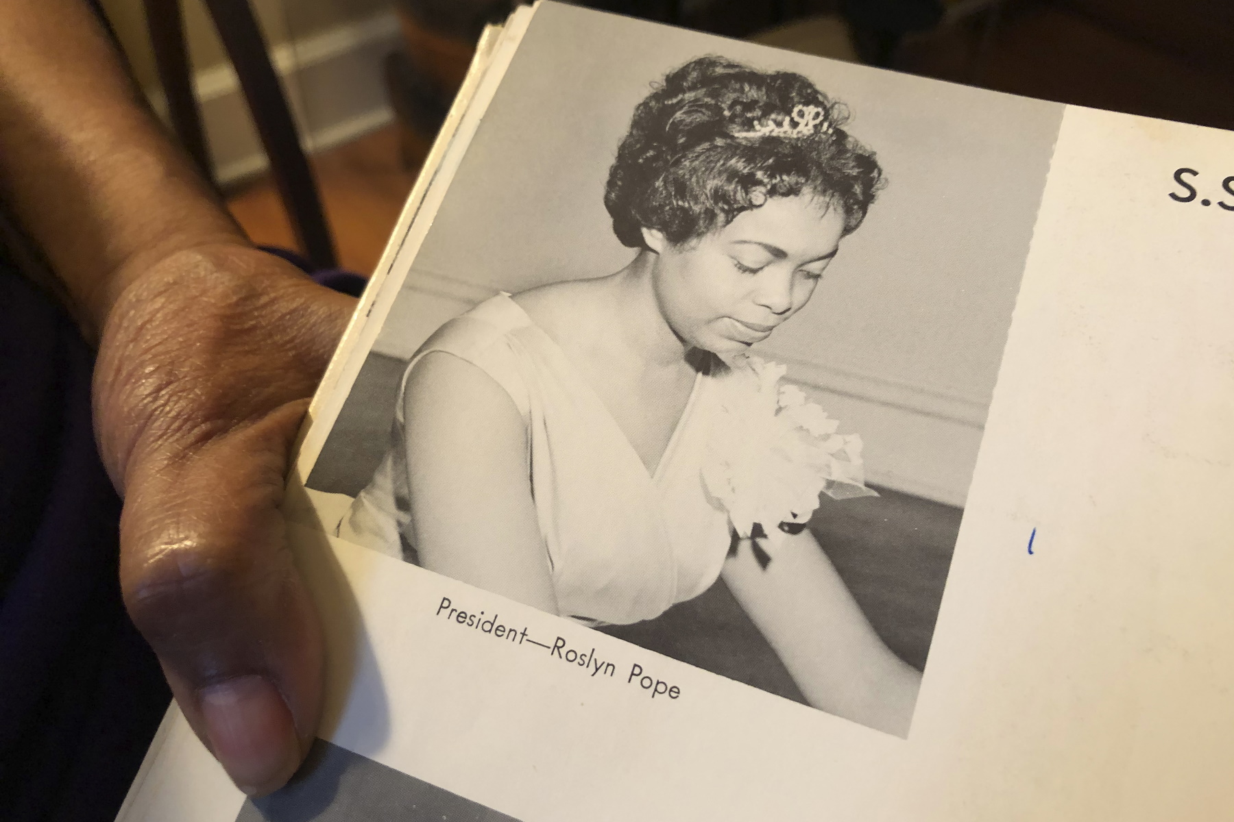 Roslyn Pope shows her Spelman College yearbook at her home in Atlanta. As a 21-year-old Spelman senior in March 1960, Pope wrote "An Appeal for Human Rights," a document that made the case for the Atlanta Student Movement, a nonviolent campaign of boycotts and sit-ins by black college students who protested racial segregation in education, jobs, housing, voting, hospitals, movies, concerts, restaurants and law enforcement. (Michael Warren/Associated Press)