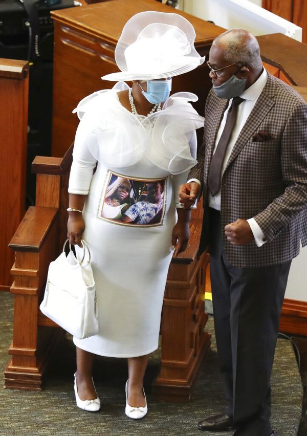 Tomika Miller, the wife of Rayshard Brooks, wears a white dress bearing a photograph of herself and her husband during his public viewing at Ebenezer Baptist Church on Monday in Atlanta.