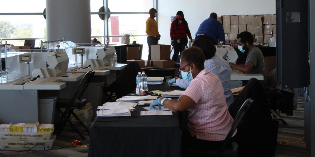 Workers process absentee ballots in Georgia.
