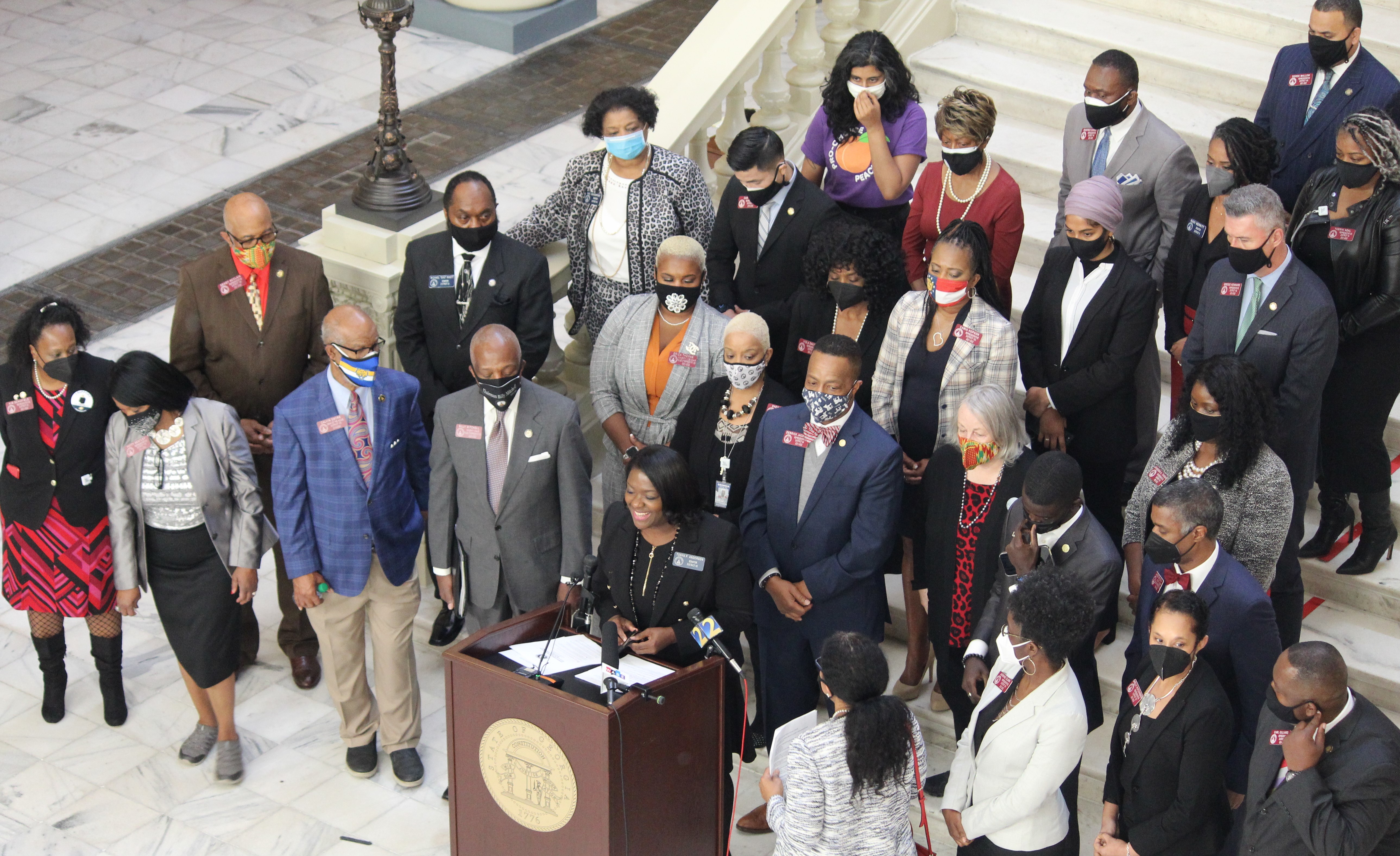 Members of the Georgia Legislative Black Caucus and allies gathered for a press conference inside the state Capitol Thursday afternoon. (Emil Moffatt/WABE)