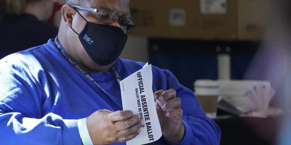 worker counts absentee ballots