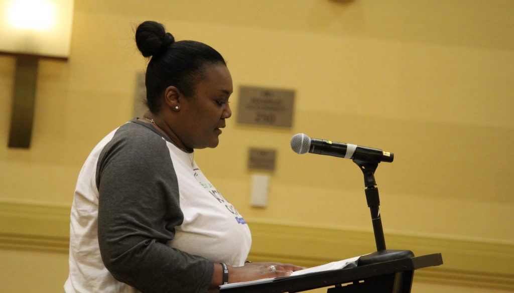 Derrica Williams, a member of the Stone Mountain Action Coalition, spoke at Monday's meeting. (Emil Moffatt/WABE)