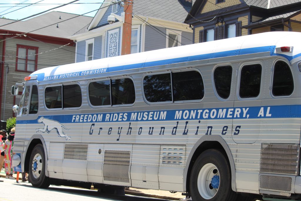 A restored 1960s bus tells the story of the Freedom Rides during the civil rights movement. It was parked in the King Historic District in Atlanta on Wednesday. (Emil Moffatt/WABE)