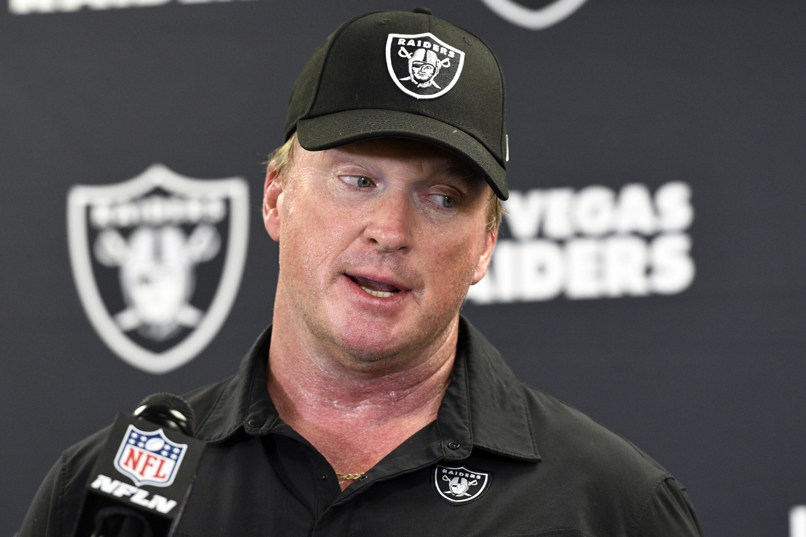 Gruden sues NFL over publication of his offensive emails
