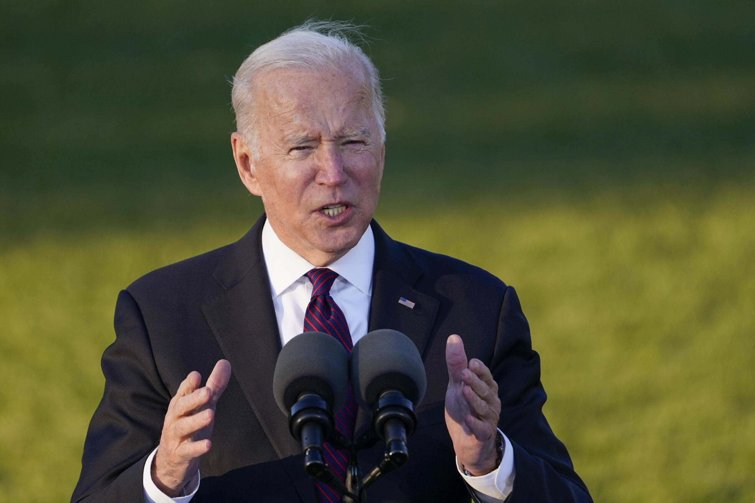 Biden signs $1T infrastructure bill with bipartisan audience
