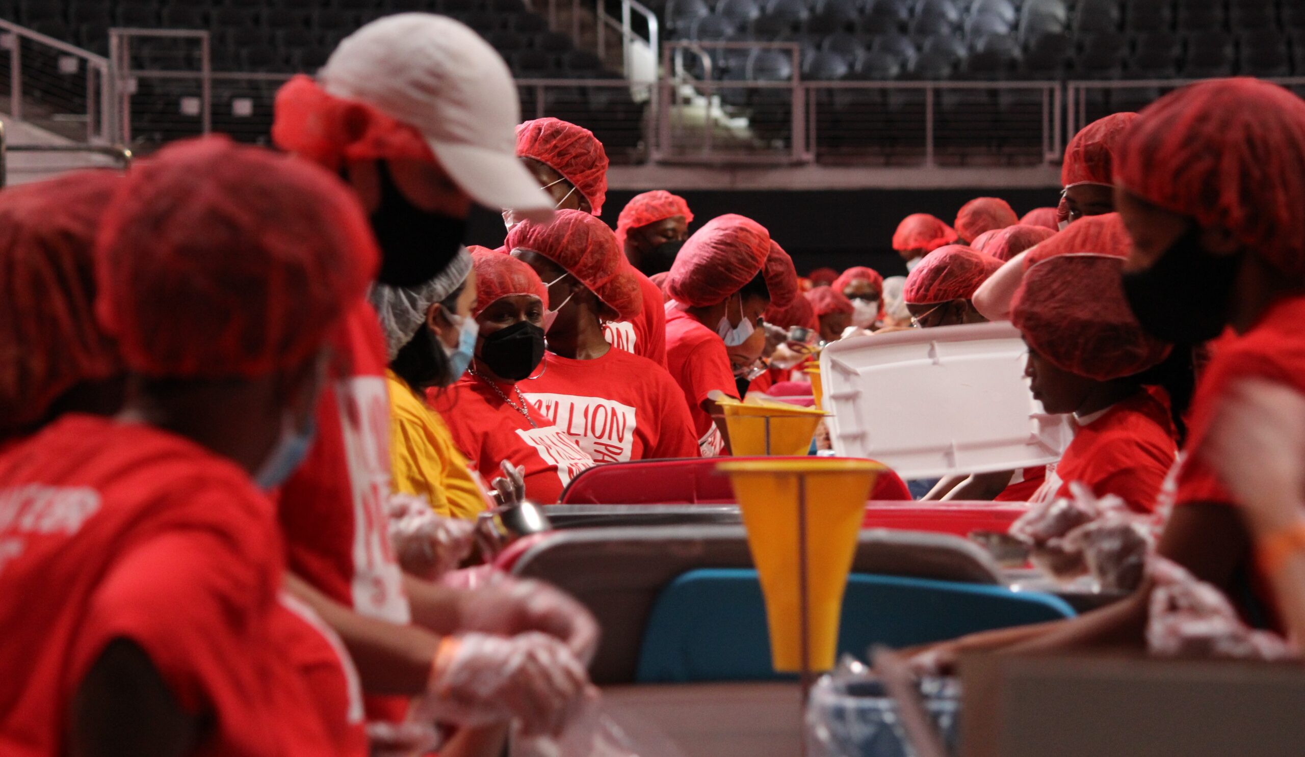 Volunteers pack State Farm Arena to pack a million meals WABE