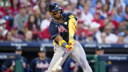 Atlanta Braves' Ronald Acuna Jr. hits a double during the third inning of Game 3 of a baseball NL Division Series against the Philadelphia Phillies, Oct. 11, 2023, in Philadelphia.