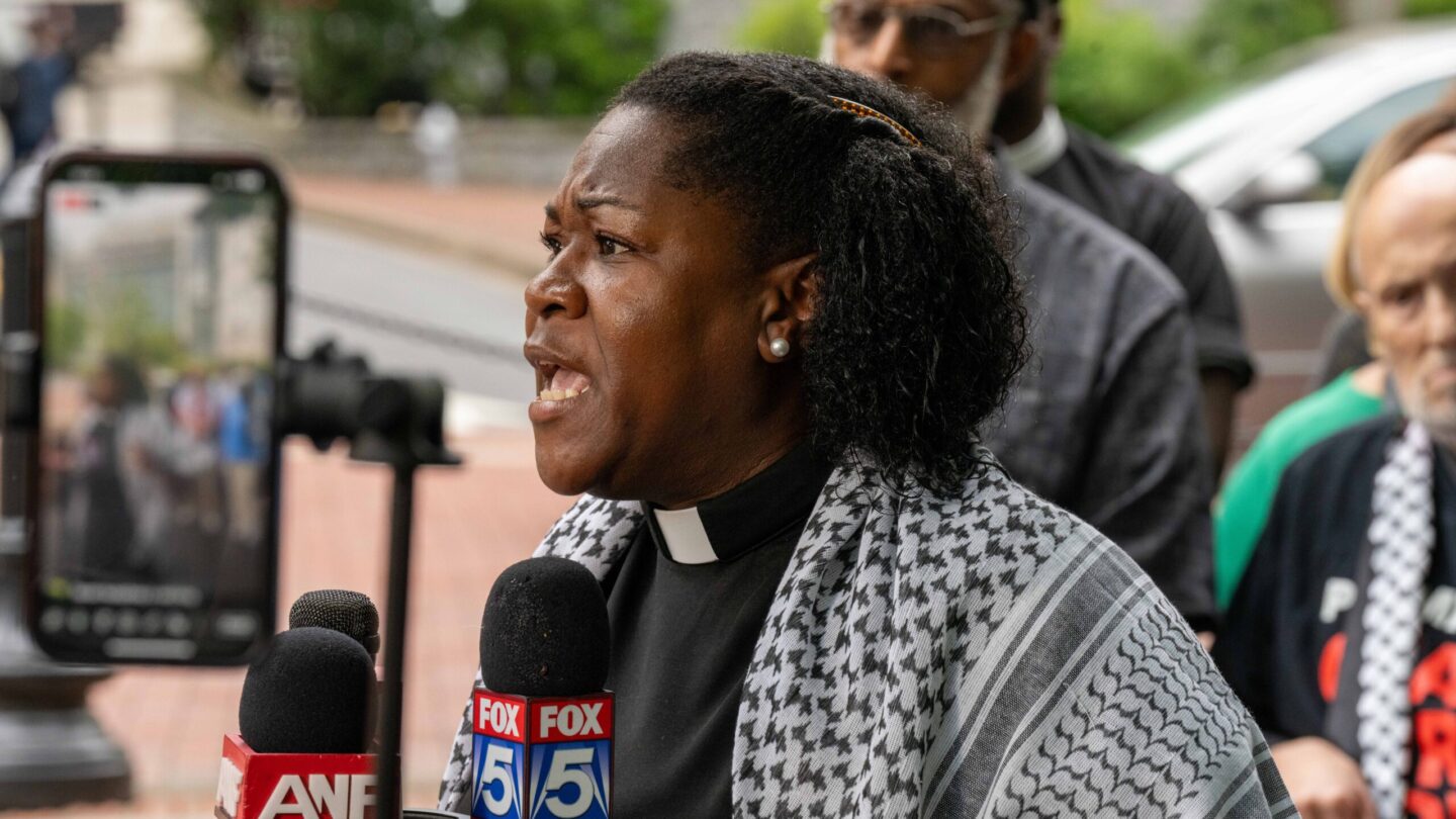 Faith leader Rev. Keyanna Jones, a co-pastor at Park Avenue Baptist Church in Atlanta’s Grant Park, speaks during a press conference on the Emory University campus on Tuesday, April 30, 2024.