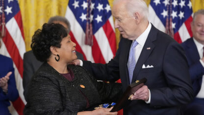 President Joe Biden awards the nation's highest civilian honor, the Presidential Medal of Freedom, to Medgar Wiley Evers, as his daughter Renee Evers-Everette accepts for the family.