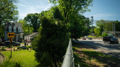 A chainlink fence is all that separates I-20 and the historic Mozley Park neighborhood in southwest Atlanta.