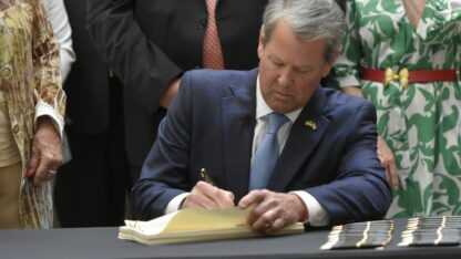 Georgia Gov. Brian Kemp vetoed a dozen bills on Tuesday on the final day for him to sign legislation into law.