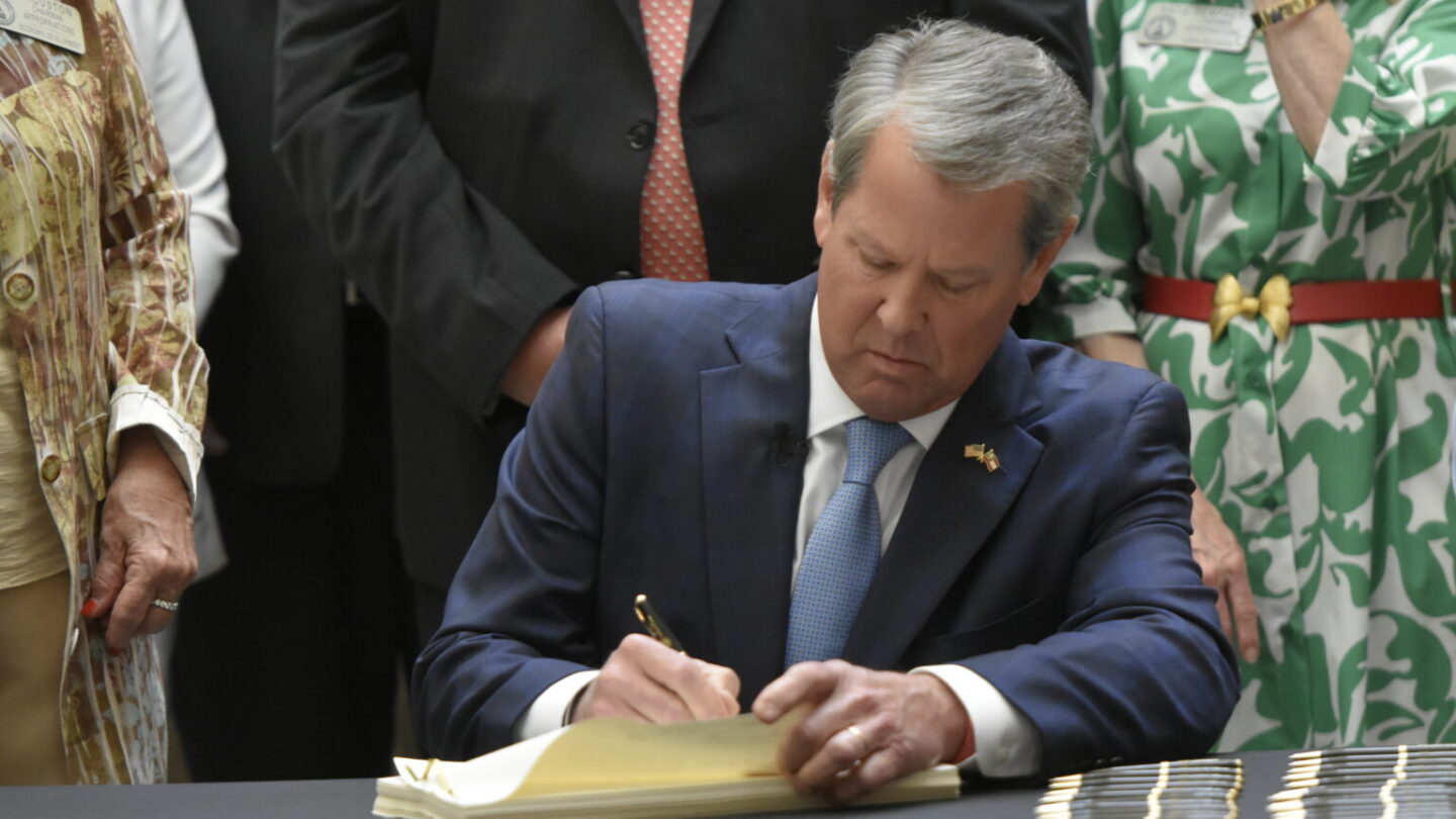 Georgia Gov. Brian Kemp vetoed a dozen bills on Tuesday on the final day for him to sign legislation into law.