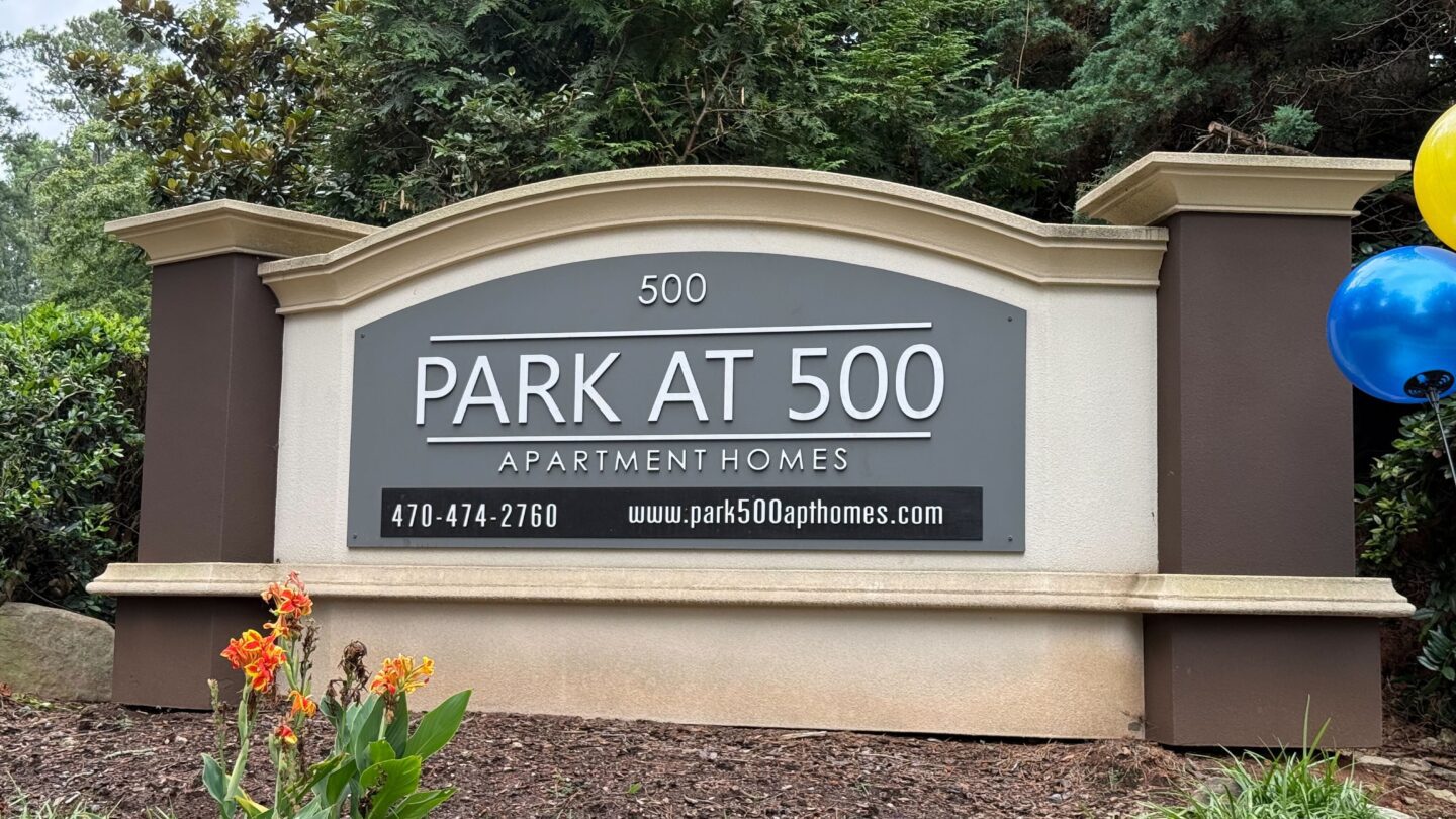 A sign for The Park at 500 Apartment complex in Stone Mountain