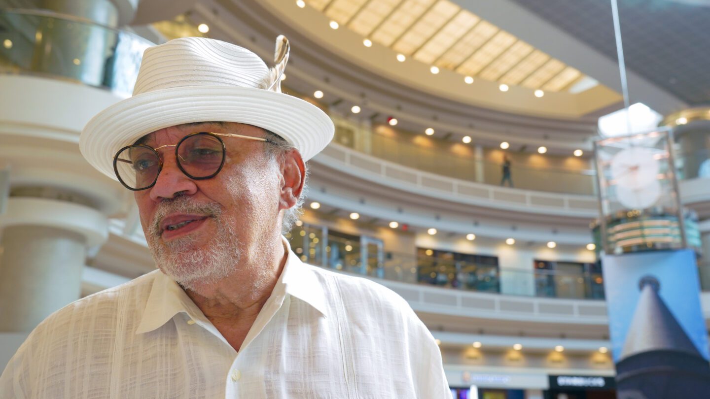 Oscar Spike Harris stands in the central atrium of Atlanta’s Hartsfield-Jackson International Airport during an interview with Closer Look.