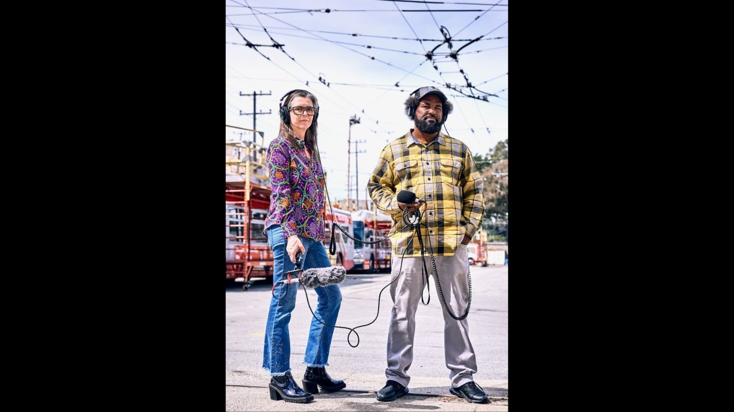 man and woman with audio kit