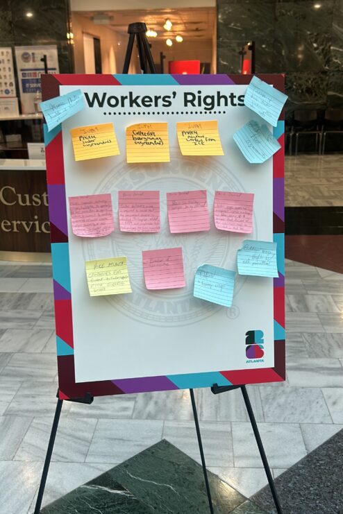 Colorful sticky notes on a board.