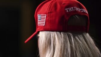 Rep. Marjorie Taylor Greene, R-Ga., wears a red hat in support of Republican presidential candidate former President Donald Trump as President Joe Biden delivers the State of the Union address to a joint session of Congress at the Capitol, Thursday, March 7, 2024, in Washington