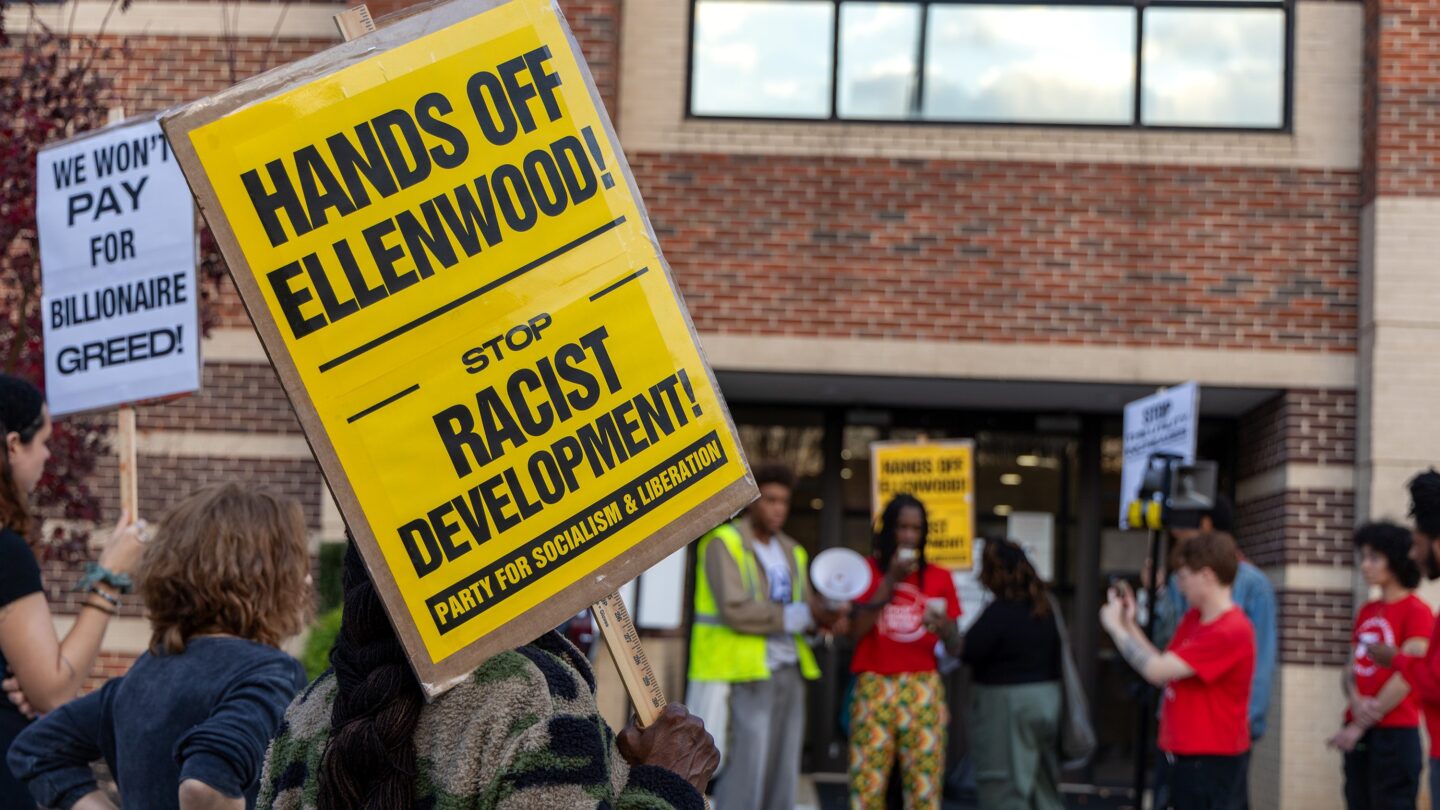 About two dozen people rally against data centers outside of the DeKalb County Government Service Center ahead of the county commission's zoning meeting on Nov. 20, 2025