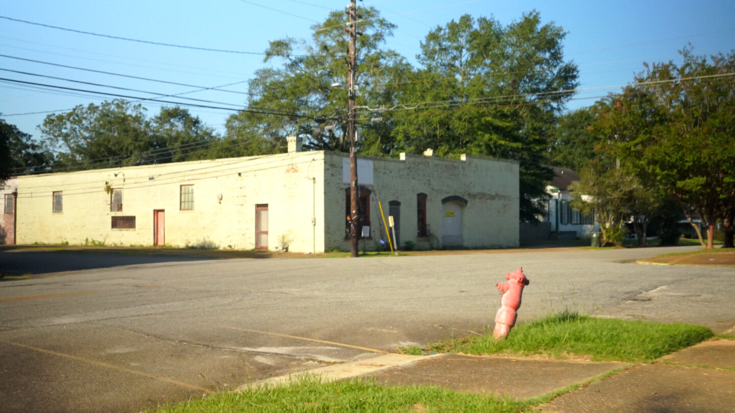 A view of a building and parking lot in Lumpkin, Georgia.
