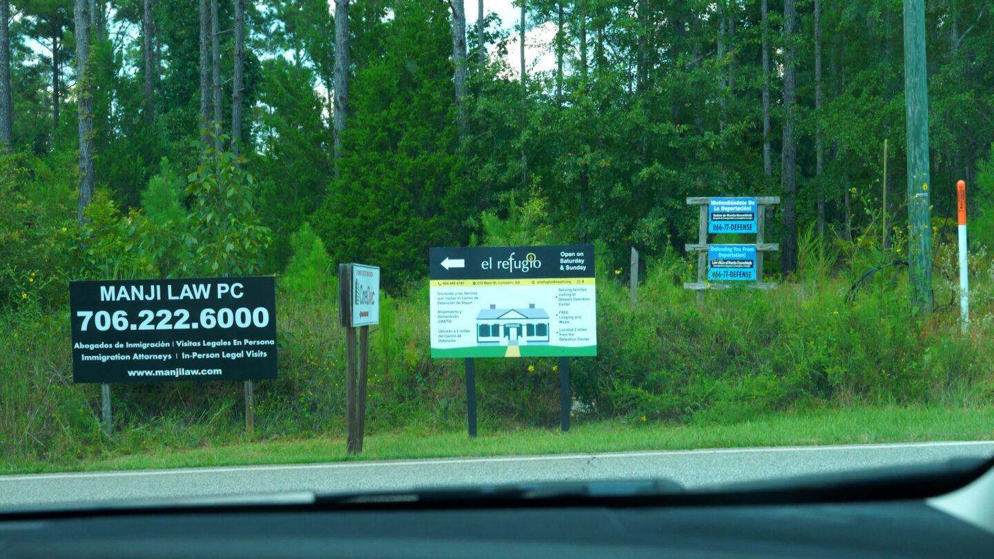 Signs for advertising legal representation outside the Stewart County Detention Center in Lumpkin, Georgia.