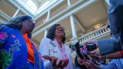 Several Georgia lawmakers are interviewed by the press inside the Georgia State Capitol
