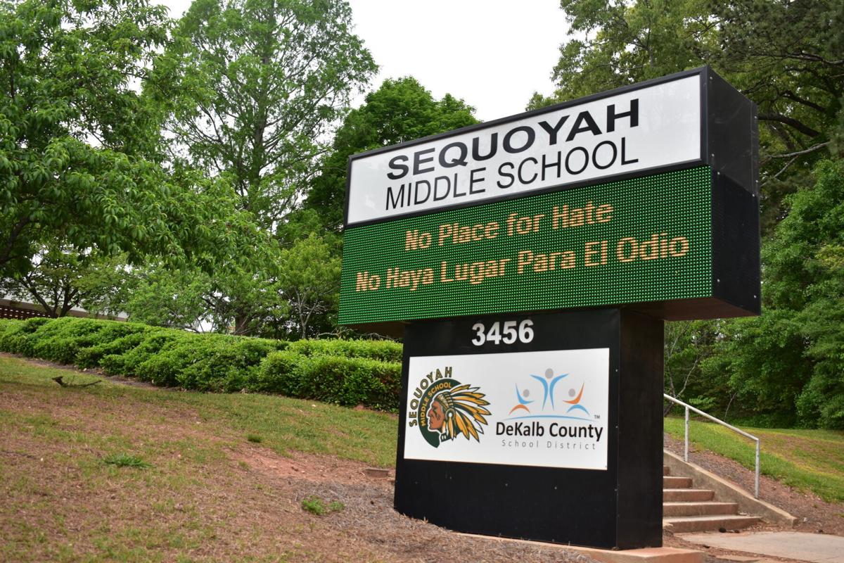 A sign saying Sequoyah Middle School is shown in front of the school