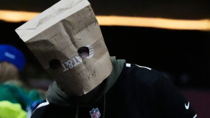 A Falcons fan with a bag over his head at the Falcons-Seahawks game