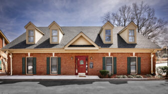 The brick building of the Mosaic Health Center