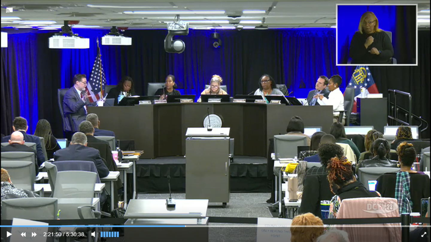 A group of commissioners voting on issues such as data centers.