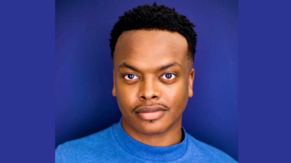 Headshot of Michael Nero wearing a blue shirt