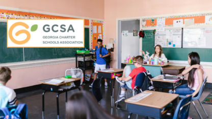 A classroom with the logo of the Georgia Charter Schools Association on the top left
