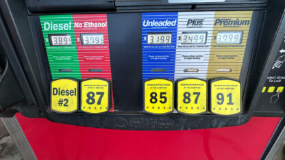 A view of electronic gas prices at the pump.