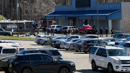 Vehicles parked outside of a Veterans Affairs clinic