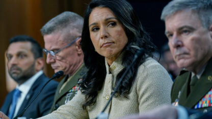 Kash Patel, James Adams, Tulsi Gabbard, William Hartman sit in a row at a congressional hearing.