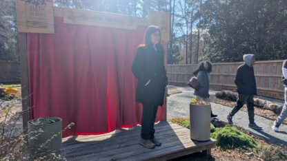 Vanita Keswani leads a group of KSU theatre students outdoors at Smith-Gilbert Gardens in Kennesaw