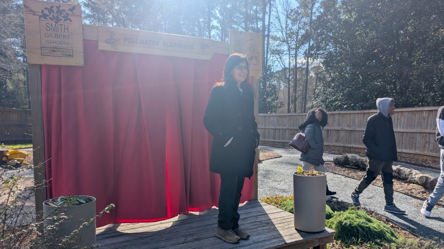 Vanita Keswani leads a group of KSU theatre students outdoors at Smith-Gilbert Gardens in Kennesaw