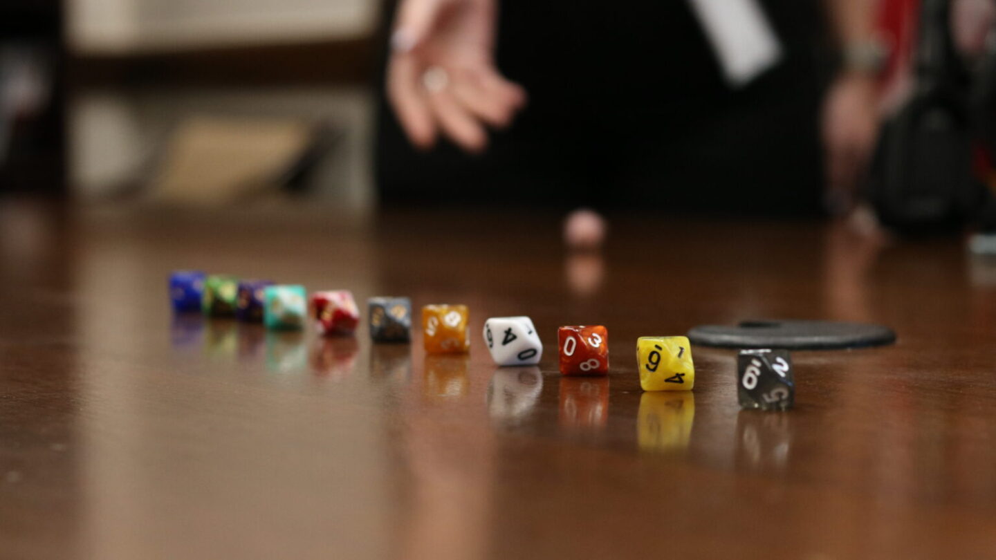 A person roll dice